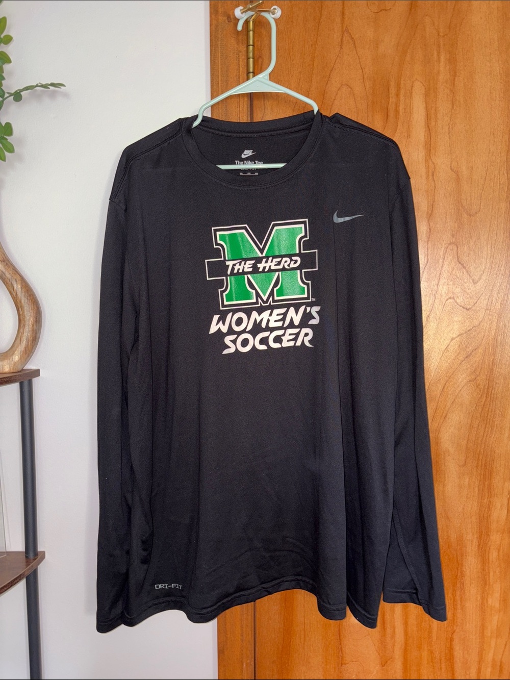 Nike Black Long-Sleeve Women’s Soccer Tee with Green 'M' Logo